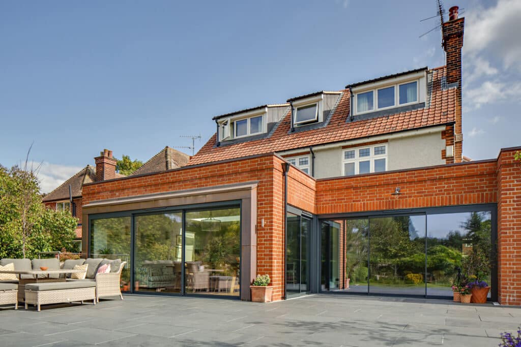 Large open plan kitchen extension with sliding doors