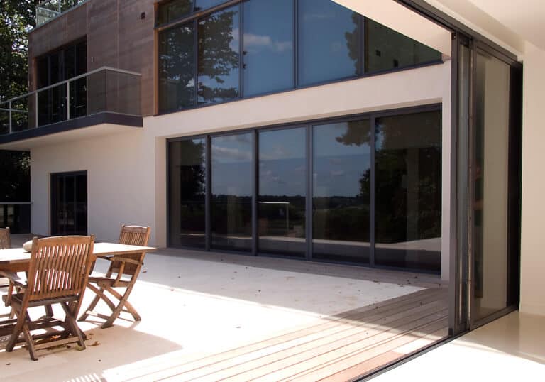 A 4-panel pocket sliding door, with two panels sliding from the centre to pockets at each end of the aperture
