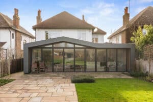 This stylish extension features 9-panels of the SF75 bifold doors across the entire rear elevation of this Surrey home
