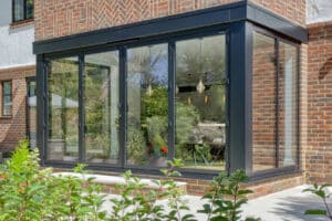 IDSystems SUNFLEX SF55 French doors with dummy door sidelights and fixed frame windows