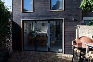 Are bifold doors a good idea? 3-panel bifold doors with black timber cladding