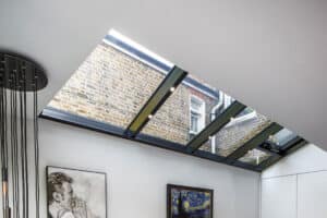 The lean-to glass roof covers the side return extension