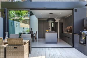 When opened up the sliding doors create a seamless transition between kitchen and patio