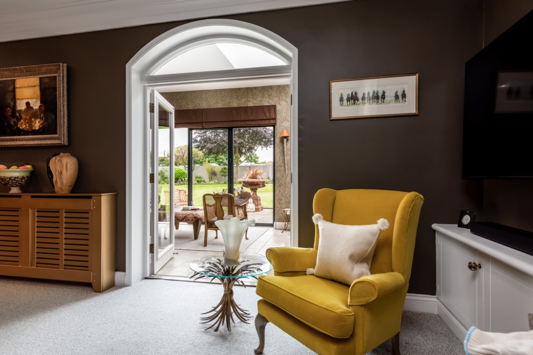 Beyond the previous back wall of the house a single storey extension with SF55 bifold doors improves the connection between house and garden