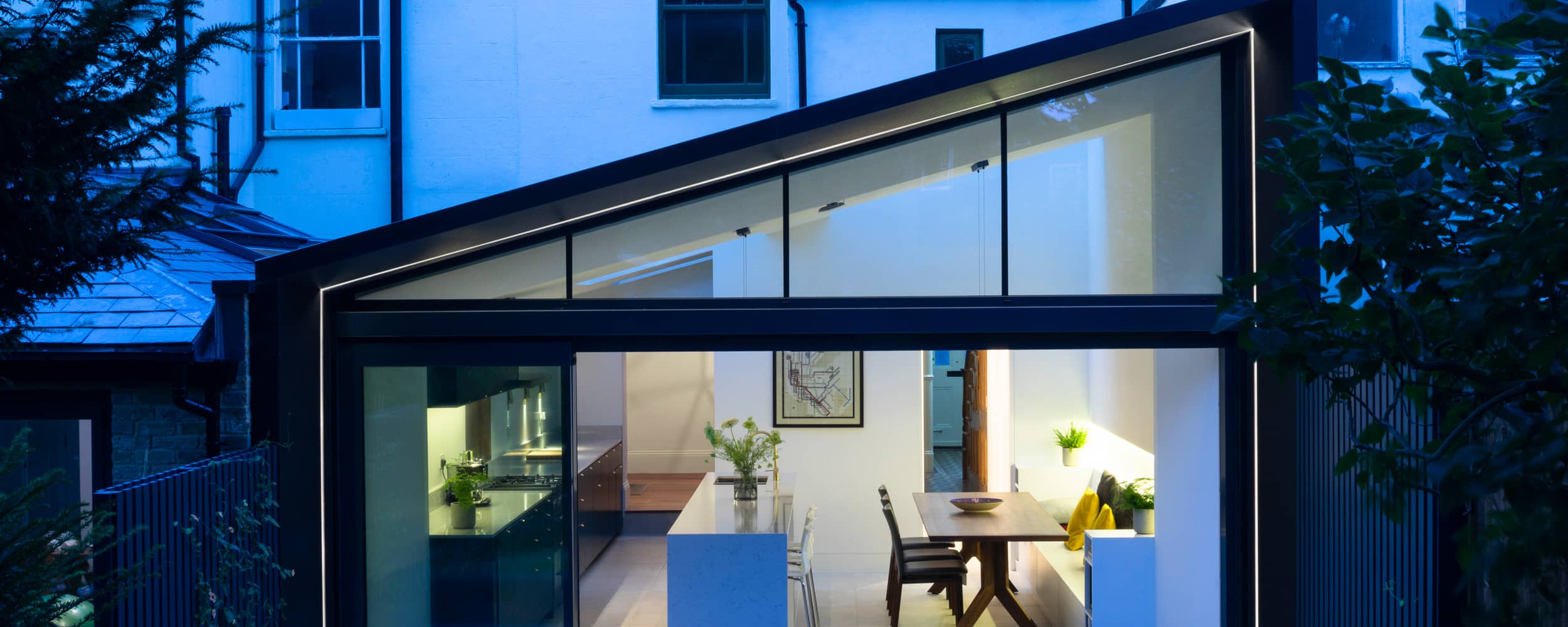 A glazed part-gable over a three panel set of sliding theEDGE2.0 on a stunning South London kitchen extension